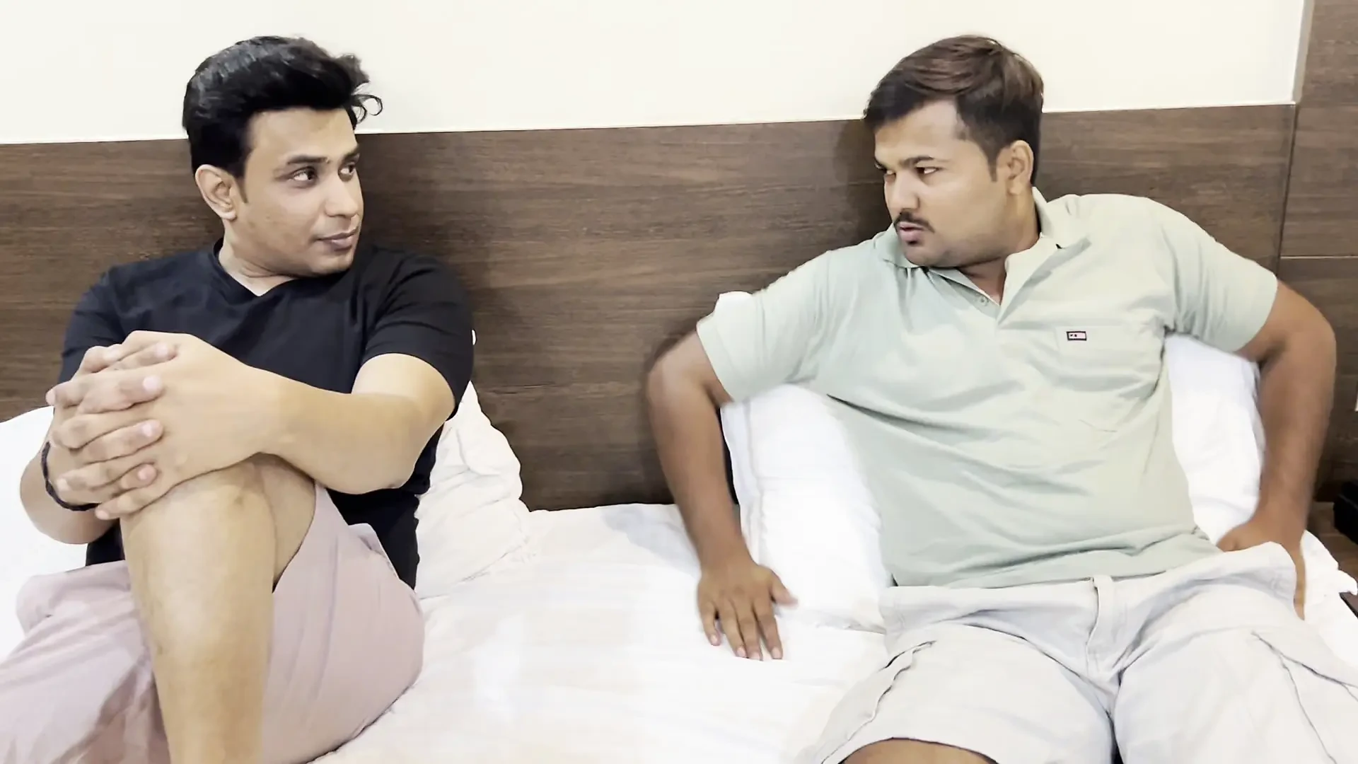 Two friends together made a waitress girl drink a hotel