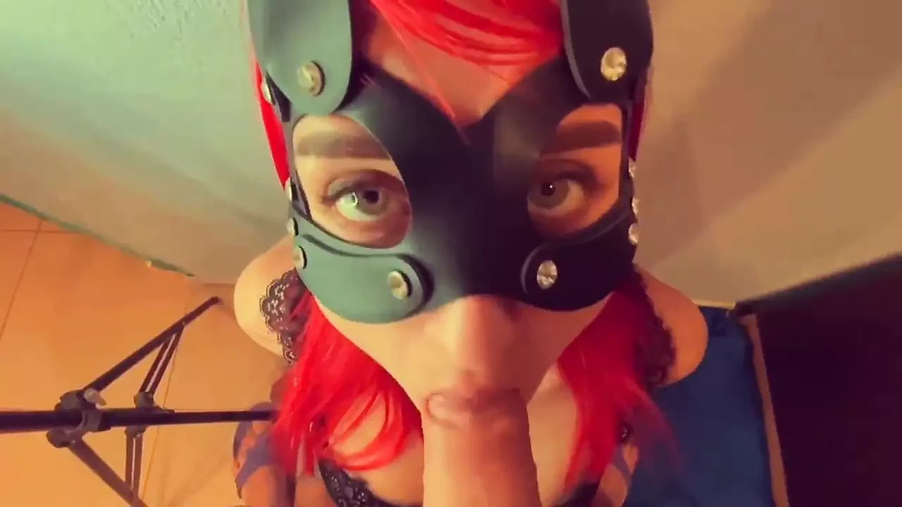 Gorgeous juicy blowjob from a beautiful girl in a cat mask with green eyes who likes to get sperm in her mouth