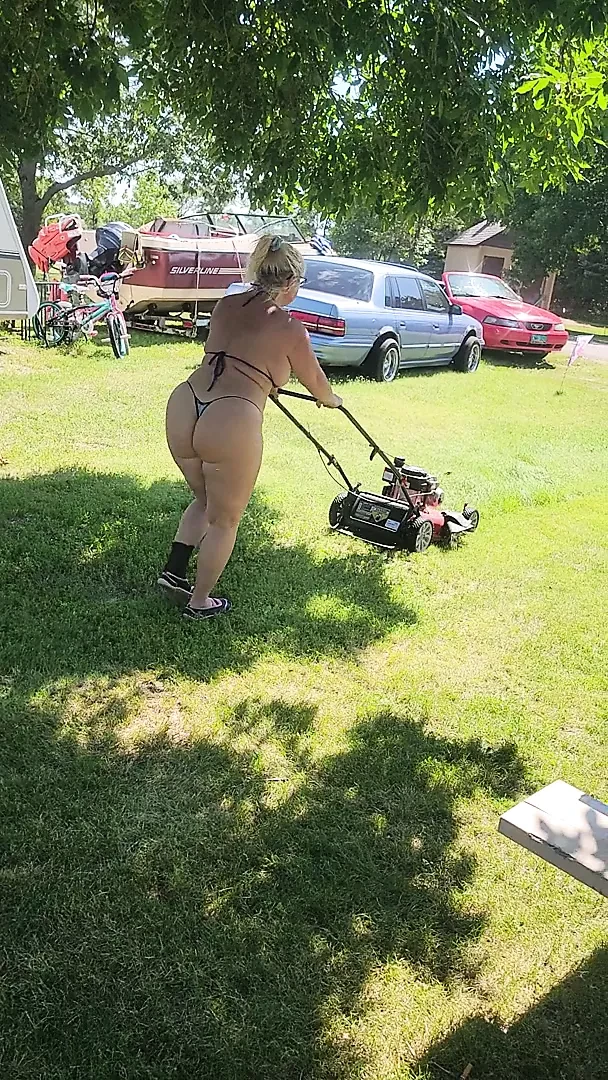 Got back to find wife mowing in a thong bikini, her ass and thighs jiggling with every step
