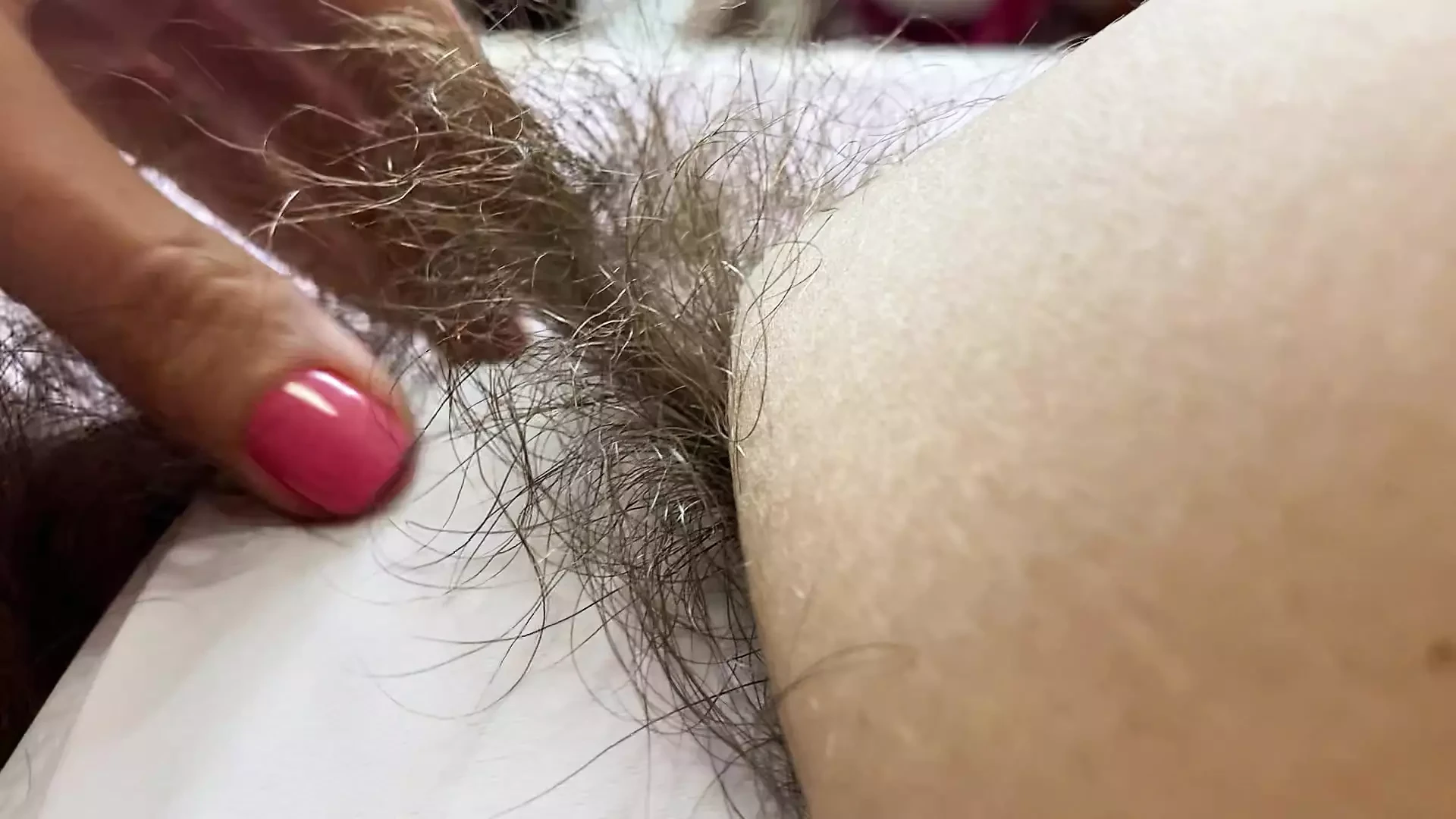 Hairy pussy in white swimsuit closeup