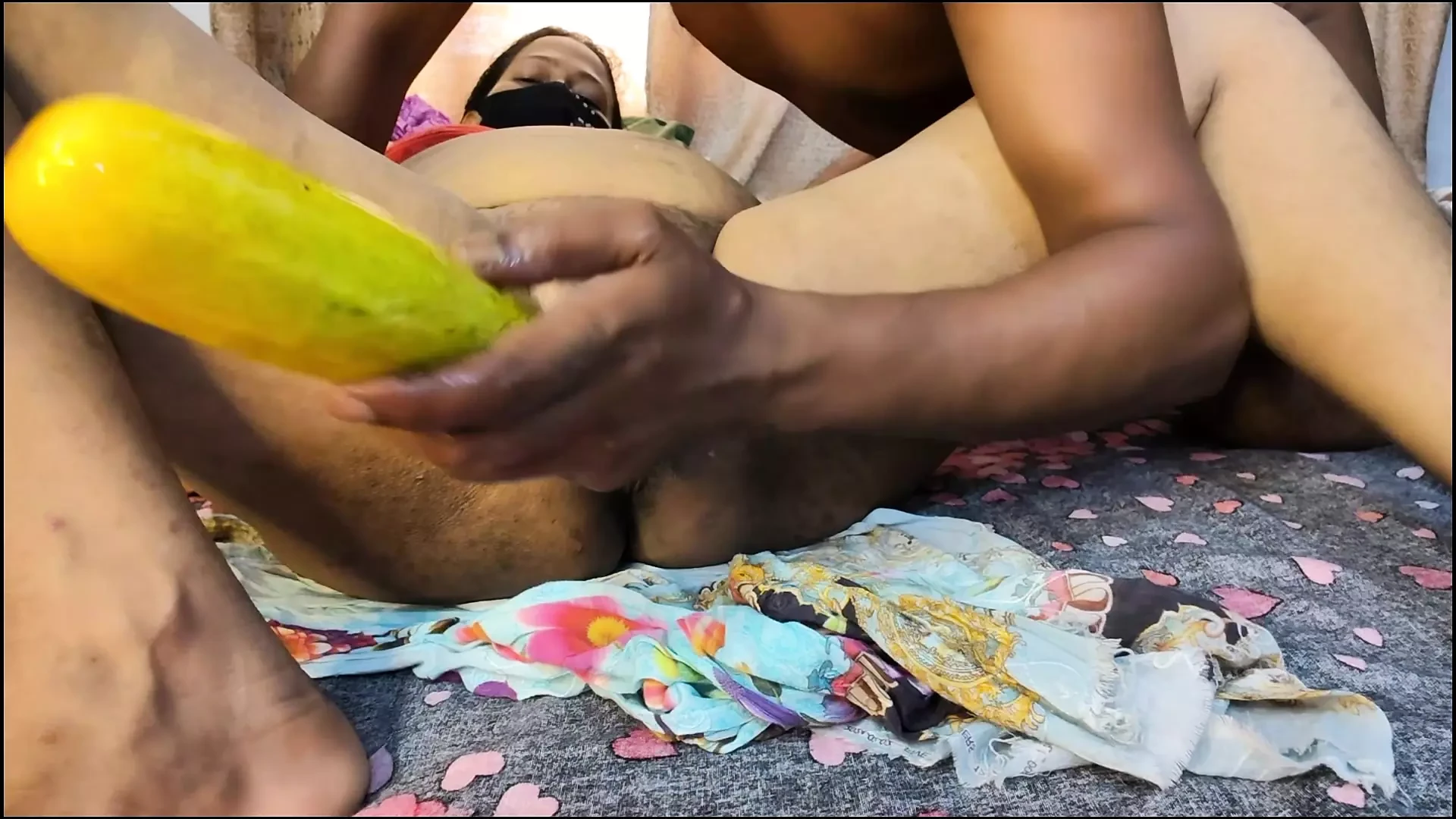 Brothers-in-law inserted a big cucumber inti bhabhi’s pussy and fucked her.