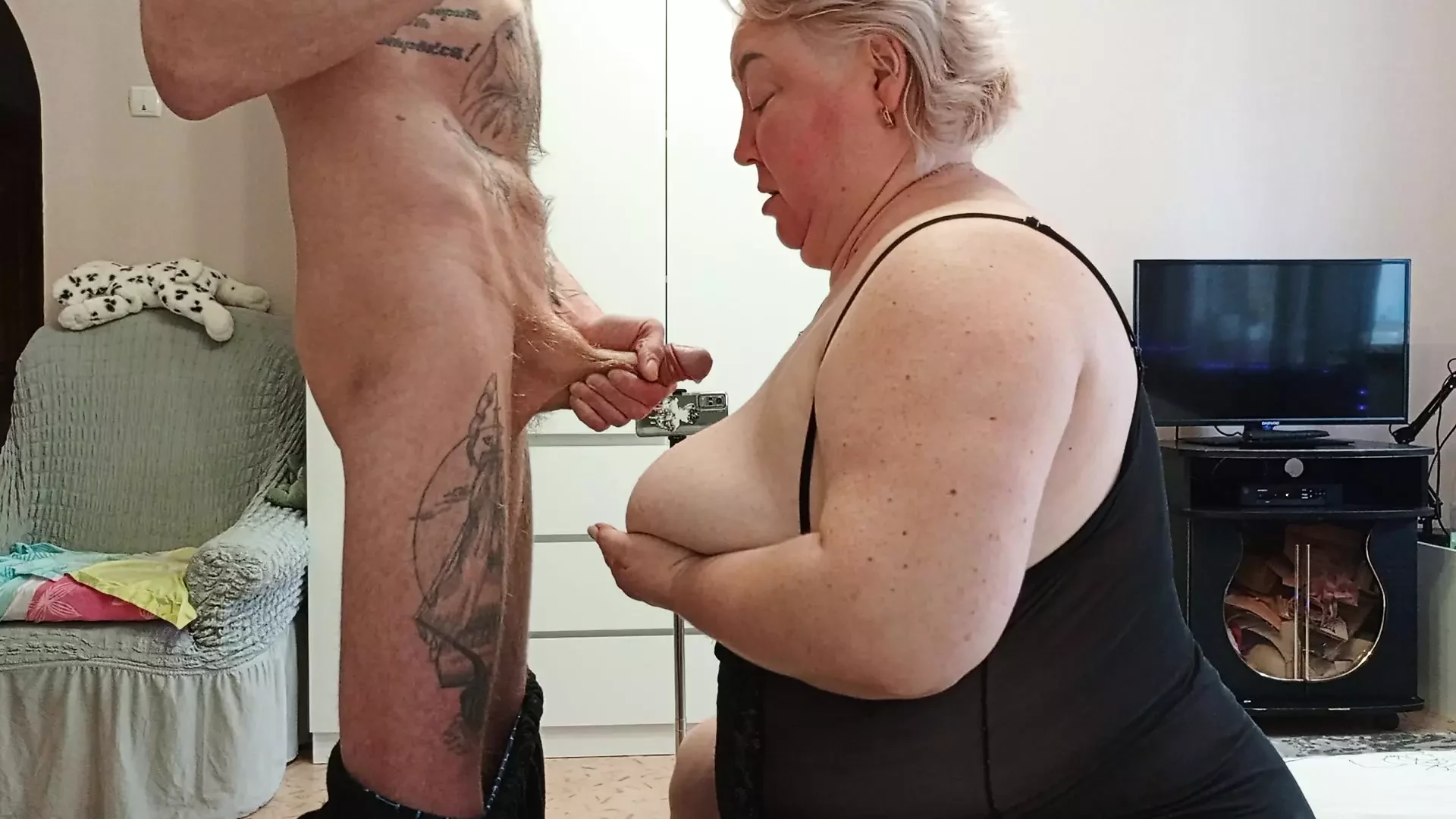 mother-in-law sucks dick and then I pour cum on her huge tits