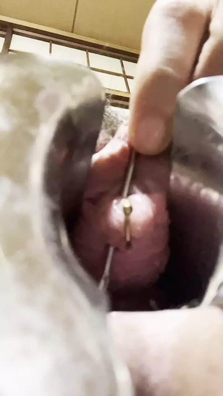 Urethral piercing