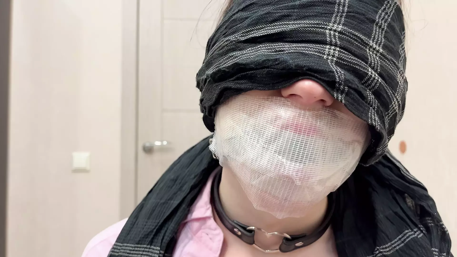 Tape tied to chair, ball gagged