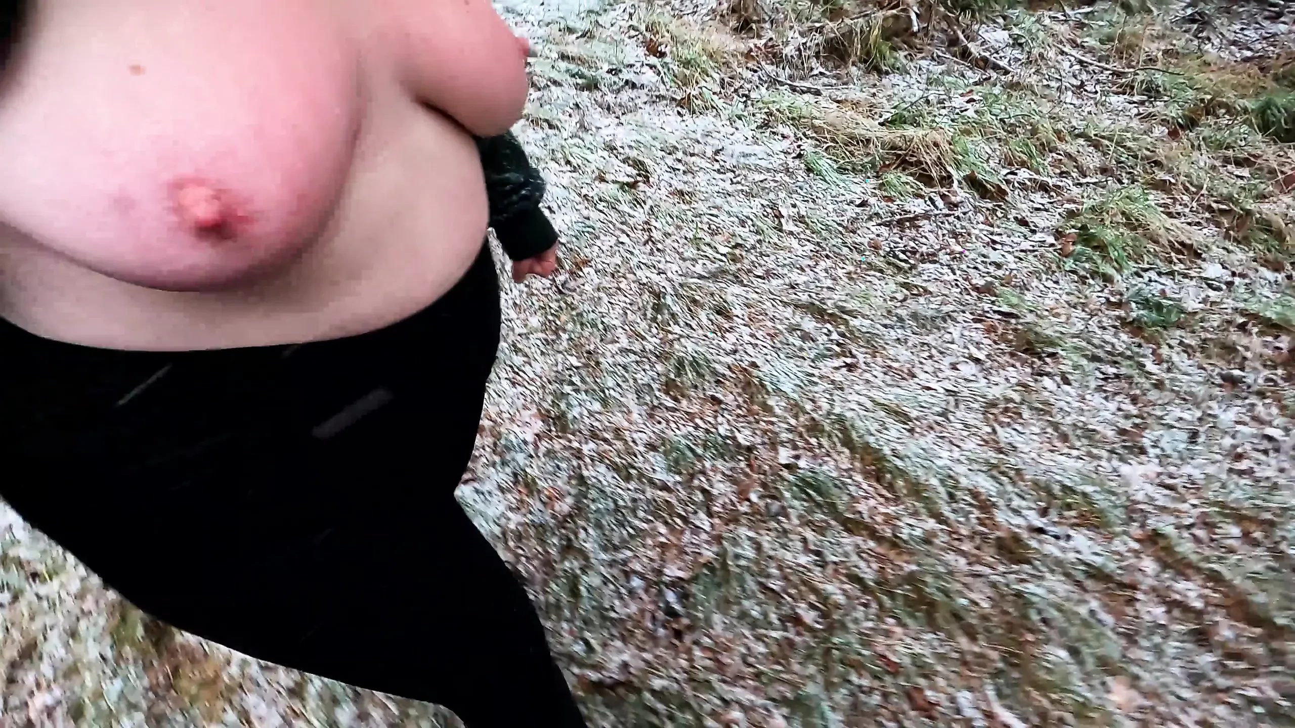 Slapping her tits while hiking through the snow
