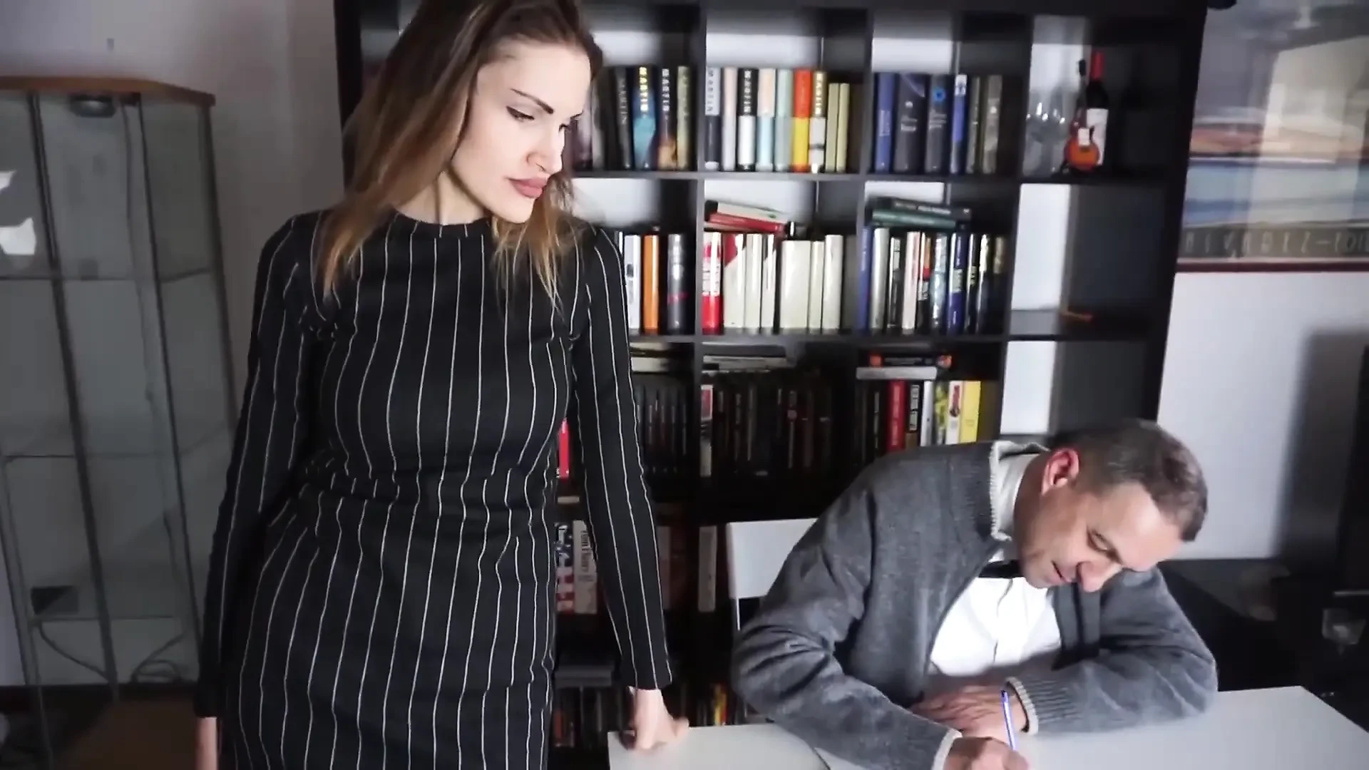 Femdom chick punishes her male slave in the office