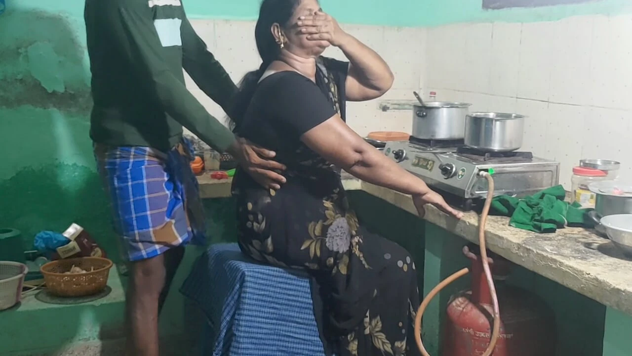 Step mother was cooking in the kitchen and I had sex with her